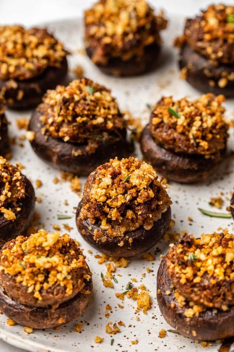 These breadcrumb-free Vegan Stuffed Mushrooms are little umami bombs, with a rich, nutty, and hearty filling baked into marinated mushrooms. They’re the BEST party appetizer or side dish! Vegan, Gluten-Free, and Grain-Free. Nut-Free Option. Gluten Free Stuffed Mushrooms, Vegan Stuffed Mushrooms, Mushroom Appetizers, Best Party Appetizers, Vegan Fries, Marinated Mushrooms, Roasted Mushrooms, Party Appetizer, Best Party