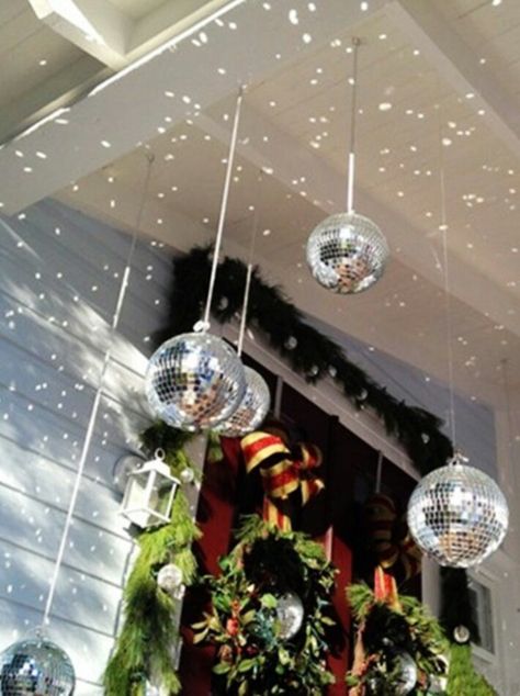 Christmas porch decor disco ball Victorian Front Porch, Holiday House Tours, Fir Trees, Christmas Porch Decor, Front Porch Decorating, Disco Balls, Front Porch Christmas Decor, Christmas Porch, Christmas Door Decorations