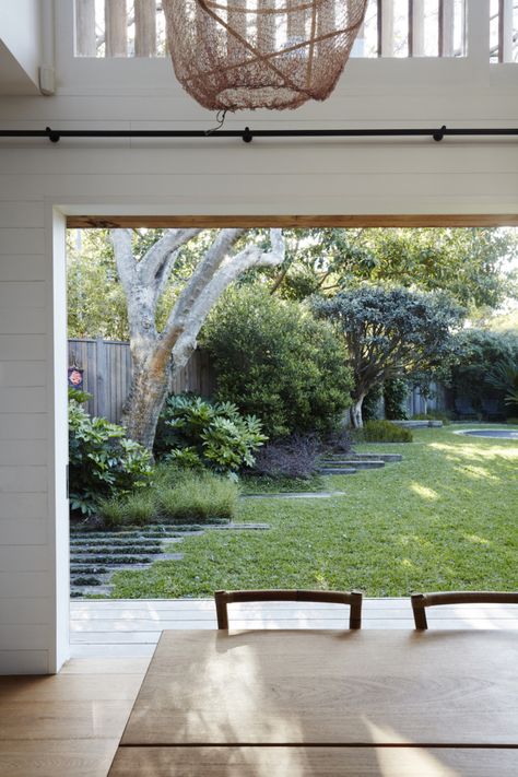 A view of the backyard garden from the dining table. The property is about a third of a mile from Bondi Beach, says Dangar, which means that “when Bondi is really busy, it is still quite peaceful at home.” Large Backyard Landscaping, Australian Native Garden, Australian Landscape, Australian Garden, Coastal Gardens, Large Backyard, Family Garden, Native Garden, Home Landscaping