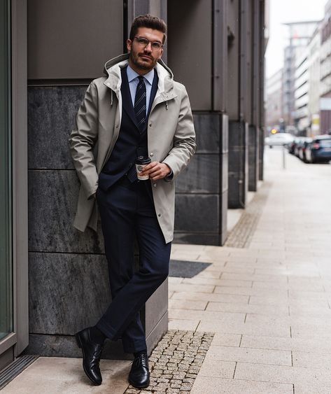 It is easy to pair a nice suit with an overcoat; it‘s a classic that always looks good. Wearing a trenchcoat to it is a winner for sure due… Rain Coat Men, Formal Photography, Raincoat Men, Mens Raincoat, Navy Blue Suit, Coat Men, Hooded Raincoat, Fashion Man, Rain Coat