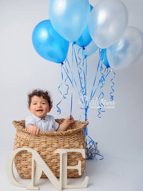 A kid is sitting in a basket for a photoshoot. #qatarbabies #qatarkids #dohababies #dohabestphotos #kids #first #qatarphotoshoot #dohaphotography #potrait #littlestarspd Boy Birthday Pictures, Vom Avea Un Copil, Baby Birthday Photoshoot, First Birthday Photography, Boy Photo Shoot, 1st Birthday Pictures, Baby Boy 1st Birthday Party, 1st Birthday Photoshoot, First Birthday Pictures