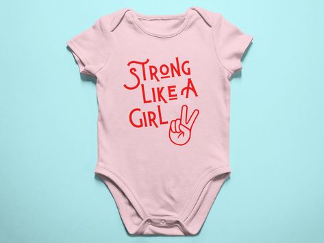 Just SOLD: Strong Like A Girl Baby Onesie | Girl Power Baby | Female Empowerment https://etsy.me/3UmzwbG #bravetshirt #girltshirt #girlpowershirt #girlpoweronesie #babyfeminist #littlegirltshirt #cutebabyonesie #girlpower #to Girl Power Baby Shower, Diy Baby Onesies Girl, Girl Onesie Ideas, Baby Girl Onesie Ideas, Big Little Sorority Shirts, 6 Month Baby Picture Ideas, Feminist Baby, Big Little Shirts, Cricut Baby