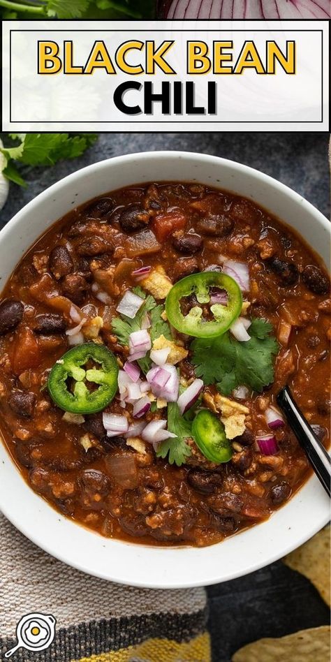 overhead photo of a bowl of black bean chili topped with red onion, jalapeños, and cilantro with recipe title block at the top. Chili Recipe Black Bean, Easy Bean Chili, Easy Black Beans Recipe, Black Beans In Crockpot, Chili With Black Beans, Black Beans Chili, Black Bean Chili Crockpot, Crockpot Black Beans, Chilli Recipe Black Bean