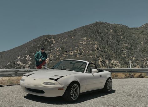 1997’ Mazda MX-5 Miata 
90s aesthetic
Crystal lake drive
Mountains
White miata 1997 Miata, Newport House, Classic Car Photoshoot, Car Photoshoot, Cars 4, Car Pics, Mazda Miata, Vroom Vroom, Cute Cars