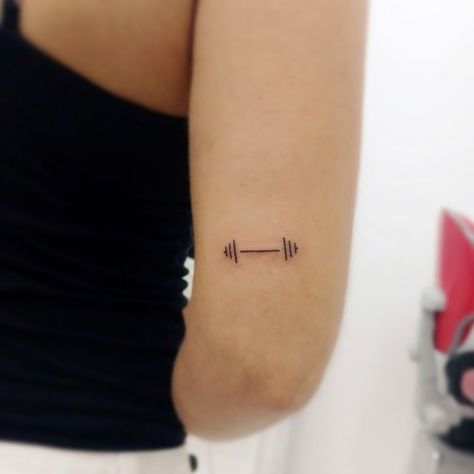 Weight Tattoo Ideas, Minimalist Barbell Tattoo, Tiny Barbell Tattoo, Dumbell Tattoo Women, Small Barbell Tattoo, Dumbbell Tattoo Design For Women, Fitness Inspired Tattoos, Weight Tattoo Fitness, Gym Inspired Tattoos