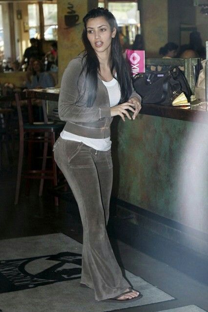 Kim K in a grey velour tracksuit 2000s Fashion Kim Kardashian, Juicy Couture Kim Kardashian, Kim K Juicy Couture, Tracksuit Outfit Juicy Couture, Juicy Couture Aesthetic 2000s, Kim Kardashian Young Style, Kim Kardashian Juicy Couture, Kim Kardashian 2000's Style, Kardashians 2000s