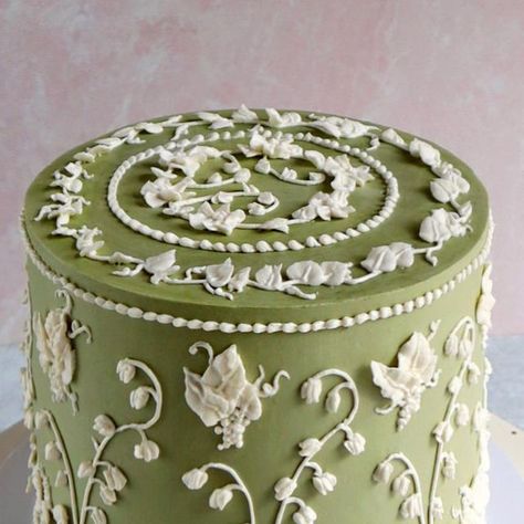 Bakey Bakes | Anybody here a fan of wedgwood porcelain?? The client wanted porcelain vibes with lilies of the valley, so this is what came of that info... | Instagram Birthday Party Green Theme, Vintage Piping Wedding Cake, Wedgewood Cake, Sage Green Baby Shower Cake, Royal Icing Wedding Cake, Dark Green Wedding Cakes, Wedgwood Cake, 20 Bday Cake, Lily Of The Valley Cake