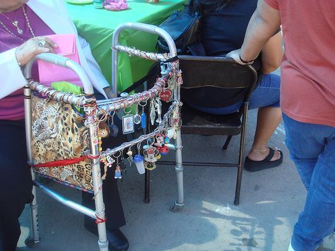 WHAT AN AWESOME IDEA! I already have duct taped mine and have a purse on it to hold all my stuff but keychains! I mean how did she get them on? Pimp My Walker  by mattieb, via Flickr Walking Cane Decorating Ideas, Rollator Decorations, Walker Decorations Decorating Ideas, Assisted Living Decor, Activities Director, Cane Decor, Nursing Home Activities, Scooter Bags, Canes Decor