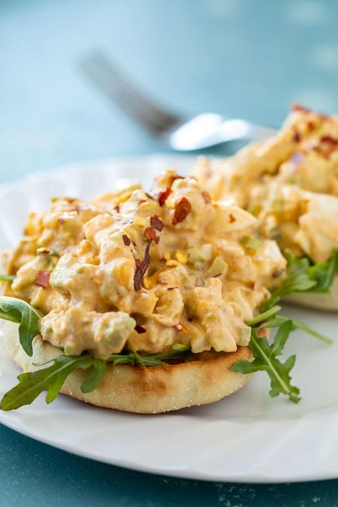 Traditional egg salad gets a big flavor boost with a spicy avocado mixture! The avocado is creamy so you need less mayo! Perfect in a salad or sandwich for easy lunches! macheesmo.com #eggsalad #avocado #spicy #easyrecipes #lunches Spicy Egg Salad Sandwich, Eggsalad Avocado, Egg Salad Sandwich, Salads Recipes, Avocado Egg Salad, Egg Salad Sandwiches, Egg Salad Recipe, Hearty Salads, Healthy Lunchbox