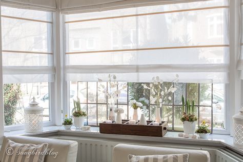 How to decorate your window sill for Spring Bay Windowsill Decor, Bow Window Decor, Window Seal Decor, Decorate Window Sill, How To Decorate A Bay Window, Decorating A Bay Window, Window Ledge Decor, Bay Window Decor, Kitchen Window Coverings