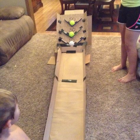 I made my own skee ball with ducktape and boxes!!!! Diy Ski Ball Cardboard, Diy Skeeball Game, Cardboard Skeeball Game, Cardboard Basketball Game, Cardboard Box Arcade Games, Pe Activities, Skee Ball, Carnival Themed Party, Wooden Games