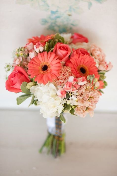 Sensuality, creativity and delicacy; the meaning of coral is such a unique way to set the tone for a wedding. The usual picks are those that speak of passion and “perfect” love, but these florals create a moment, a memory and an event unlike any other. Let’s take a peek at coral floral clusters that can easily fill your bridal bouquet. Make sure you take a look at our first round of inspiration here too.     via Pinterest Spring Wedding Bouquets, Spring Wedding Bouquet, Boda Mexicana, Spring Wedding Flowers, Coral Wedding, Wildflower Bouquet, Mod Wedding, Flower Ideas, Beautiful Bouquet