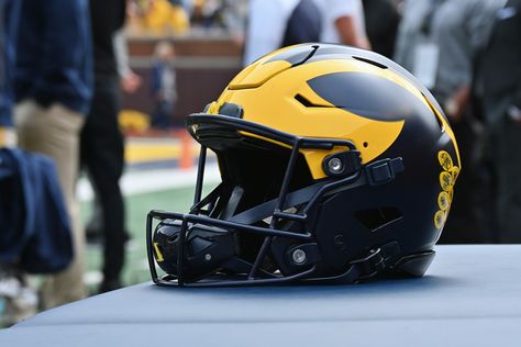 Michigan Unveils New Addition To Helmet For College Football Playoff. The Michigan Wolverines unveiled a new addition to their iconic Helmet on Friday. Michigan Football Helmet, 2023 Schedule, College Football Playoff, Michigan Football, Big Ten, Football Program, Go Blue, Michigan Wolverines, Michigan State