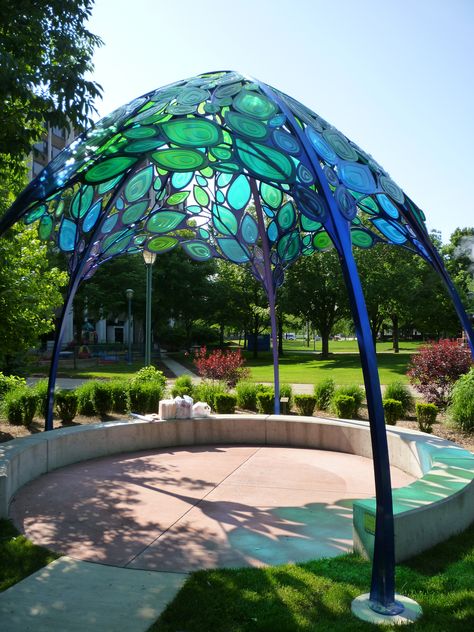 Seating area under a beautiful stained-glass art installation Glass Gazebo, Glass Art Installation, Urban Garden Design, Have Inspiration, Art Stained, Glass Mosaics, Stained Glass Projects, Bath Soak, Gorgeous Glass