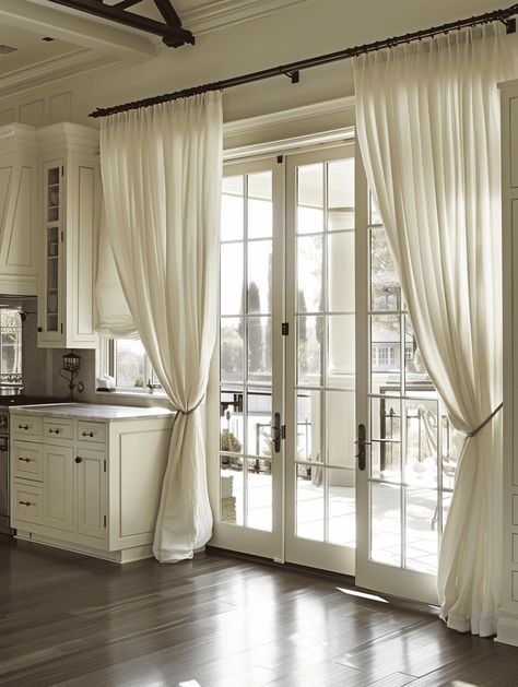 Should French Doors Have Curtains [And How To Install Them]? Curtains French Doors Kitchen, Interior French Door Curtains, Farmhouse French Doors Curtains, French Doors Patio Farmhouse, Curtains On Doors With Windows, French Doors Kitchen To Patio, Bedroom French Door Curtain Ideas, Window Treatments For Patio Doors, Double French Doors Living Room