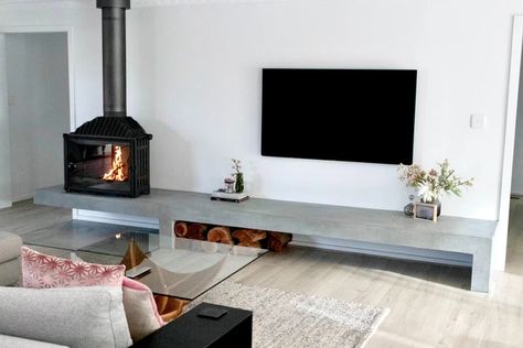 23. Concrete Fire Hearth with Floating Section and Matching Concrete Floor Tile - Mentone | concrete fireplaces Fire Hearth, Beach Fireplace, Concrete Studio, Concrete Tile Floor, Floating Fireplace, Classic Fireplace, Types Of Concrete, Concrete Products, Concrete Fireplace