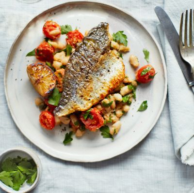 Pan-fried sea bream with cannellini beans and tomatoes Crumbed Prawns, Scallop Pie, Sea Bream Recipes, Prawn Cocktails, Seafood Board, Waitrose Food, Beans And Tomatoes, Salmon Skewers, Bbq Salmon