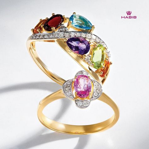 These two rings are alluring in their own ways, with one highlighting the beauty of oval cut pink sapphire stones sets with diamonds around it, and the second piece gleaming with the beauty of pear cut amethyst and blue topaz with oval cut citrine, garnet, peridot, and round diamonds set in a 375 yellow gold ring. Luxury Yellow Gold Multi-stone Gemstones, Fine Jewelry Yellow Multi-stone Rings, Yellow Multi-stone Fine Jewelry, Luxury Multi-stone Citrine Rings, Luxury Multi-stone Yellow Sapphire Jewelry, Gemstone Diamond Ring, Round Diamond Setting, Diamond Ring Settings, Sapphire Stone