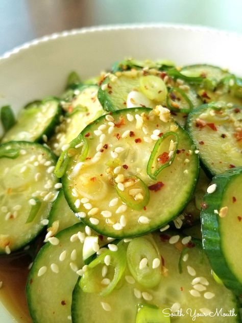 Korean Cucumber Salad | A crisp and punchy Korean inspired cucumber salad recipe with green onions, red pepper flakes and sesame seeds tossed with a light, super simple – but absolutely perfect – dressing made of rice vinegar, soy sauce and a little sugar. Warning: this stuff is addicting! #korean #cucumbersalad Cucumbers Salad, Korean Cucumber Salad, Green Onions Recipes, South Your Mouth, Refreshing Salads, Korean Cucumber, Vinegar Cucumbers, Dorm Fridge, Japanese Cucumber