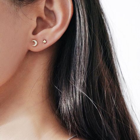 My moon and all my stars... cosmic ear party in our 14K solid gold star and moon stud set  #thingseyelove Double Ear Piercings, Piercing Inspo, Double Piercing, Second Piercing, Cute Ear Piercings, Moon Studs, Ear Piercing, Emerald Earrings, Gold Earrings Studs