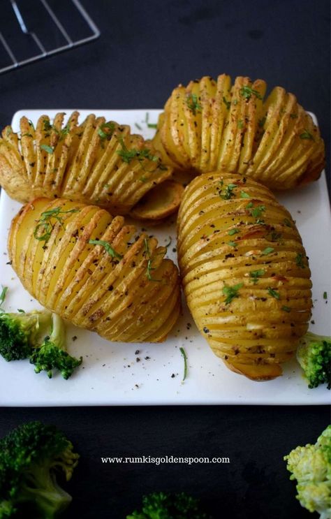 hasselback potatoes, hasselback potatoes recipe, recipe for hasselback potatoes, how to make hasselback potatoes, hasselback potatoes garlic, garlic butter hasselback potatoes, hasselback potatoes with garlic, potato recipe baked, potato recipes, potato recipe easy, potato recipe for oven, potato recipes baked in oven Baked Potato Recipe, Golden Spoon, Hasselback Potatoes, Baked Potato Recipes, Indian Kitchen, Potato Recipe, Fusion Food, Vegetable Sides, Vegetarian Dishes