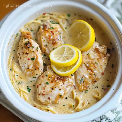 Crockpot Chicken Francese, Lemon Chicken Pasta Crockpot, Chicken Tender Crock Pot Recipes, Crock Pot Lemon Garlic Butter Chicken, Lemon Garlic Chicken With Creamy Bowtie Pasta, Lemoncello Chicken, Lemon Crockpot Chicken, Crockpot Lemon Garlic Butter Chicken, Lemon Chicken Crockpot