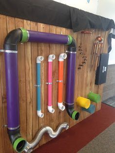 DIY Sensory/Music Wall for children with vision impairments. Simple layout to avoid visual clutter but enough items to provide experiences with cause and effect. Maker Fun Factory Vbs 2017, Maker Fun Factory Vbs, Maker Fun Factory, Diy Sensory, Sensory Wall, Sensory Rooms, Sensory Garden, Outdoor Music, Sensory Boards