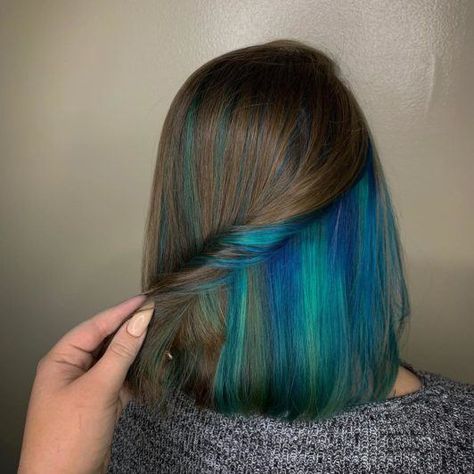 Peekaboo highlights: Woman with dark brown shoulder length bob with hidden blue and green highlights Blue Hair Color Highlights, Hidden Hair Color, Peekaboo Hair Colors, Underlights Hair, Peekaboo Highlights, Hair 101, Peekaboo Hair, Hair Color Streaks, Hair Streaks