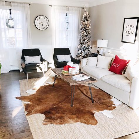 Modern boho living room, cowhide rug ideas, mid century modern living room, Christmas living room, modern interior design, cow skin rug, living room ideas, neutral living room, Mid Century Modern Living Room Rugs, Print Rug Living Room, Layered Cowhide Rug, Cowhide Rug Living Room, Mid Century Modern Rugs, Neutral Interior Design, Modern Boho Living Room, Modern Rugs Living Room, Print Rug