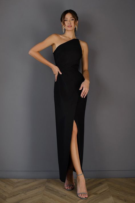 Enhance your fashion sense with ELAGIA's Black Asymmetric Sleeveless Maxi Dress, a blend of modern chic and classic elegance. Featuring an enticing asymmetrical design and a sleeveless silhouette, this dress exudes effortless sophistication, perfect for making a bold statement at upscale occasions. #blacksleevelessdress #asymmetricstyle #modernchic #elegantensemble #eveningattire #womensfashion #boldstatement #maxidressstyle Black Gala Dress, Shawl Lapel Suit, Formal Attire Women, Black Tie Dress Wedding, Wedding Guest Dress Inspiration, Black Tie Wedding Guest Dress, White Shawl, Zipper Lock, Black Tie Wedding Guests