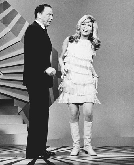 I thought Nancy Sinatra in her white go-go boots was the coolest person ever!  Whenever I'd wear my white go-go boots (yes, I had a pair just because Nancy S had a pair!) I'd always sing, "These boots were made for walking ..."  Keep in mind I was about ten years old at the time. ;-)  ~Debi  #debihough White Go Go Boots, Gilby Clarke, Joely Fisher, Go Go Boots, Nancy Sinatra, Tony Bennett, Swinging Sixties, Gogo Boots, Dean Martin