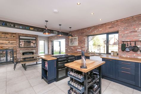 Brick, navy, grey, wood and rose gold kitchen 😍😍 Navy Blue And Rose Gold Kitchen, Navy Industrial Kitchen, Blue And Brick Kitchen, Navy Blue Kitchen Cabinets Brick Backsplash, Kitchen Design Rose Gold, Blue And Rose Gold Kitchen, Navy And Rose Gold Kitchen, Navy And Wood Kitchen, Navy And Gold Kitchen