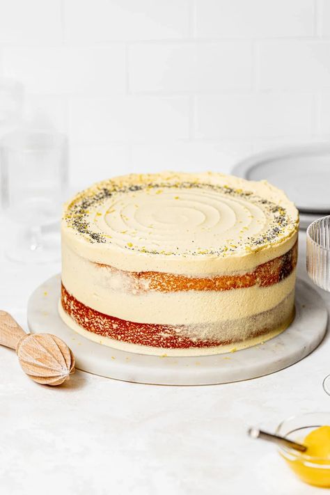 What better way to celebrate spring than with this poppy seed swirled lemon curd cake! Between the striking swirled cake layers is a tart homemade lemon curd, and on the outside is a swoon-worthy cream cheese german buttercream. Its custardy pastry cream base pairs beautifully with the nutty poppy seeds and lip-puckering lemon curd! Cool Deserts, German Buttercream, The Best Birthday Cake, Lemon Poppy Seed Cake, Curd Cake, Mini Carrot Cake, Key Lime Cake, Lemon Curd Cake, Homemade Lemon Curd