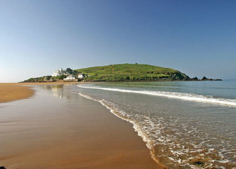 "Tucked away in a peaceful corner of Devon Challaborough Bay is set right by a beautiful Blue Flag beach that’s lapped by shallow waters inviting you to dip a toe in. With stunning views across to Burgh Island and a pretty coastal path nearby it’s the perfect place to get away from it all.\n\nSet at the end of a valley on the sandy curve of Bigbury Bay Challaborough Bay boasts fantastic facilities with fun for everyone. The whole family will love the indoor pool while the kids will love the adve Art Deco Hotel, Devon Coast, Gopro Surfing, South West Coast Path, South Devon, Sup Surf, Holiday Park, Water Photography, Windsurfing