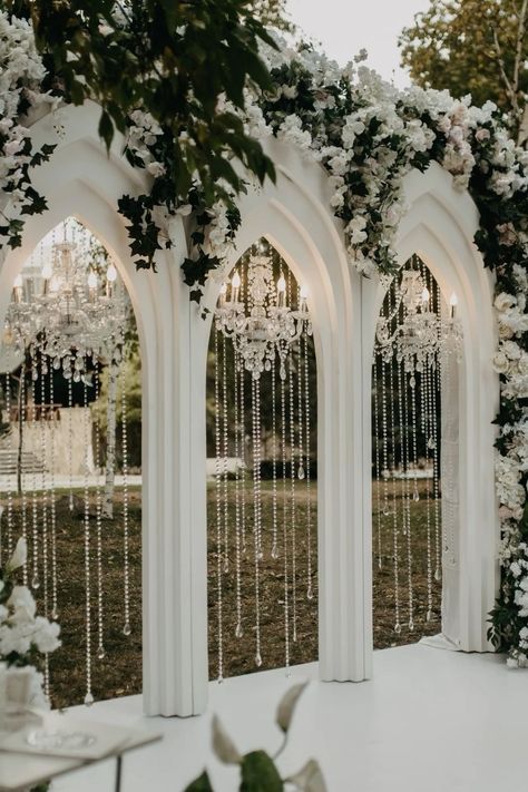 Engagement Themes Decor Outdoor, Engagement Backdrops Ideas, Majestic Wedding Decor, Chandelier Wedding Backdrop, Wedding Ceremony Canopy, How To Decorate Arch For Wedding, Victorian Wedding Arch, Pavillion Wedding Ceremony Decor, White Proposal Decor