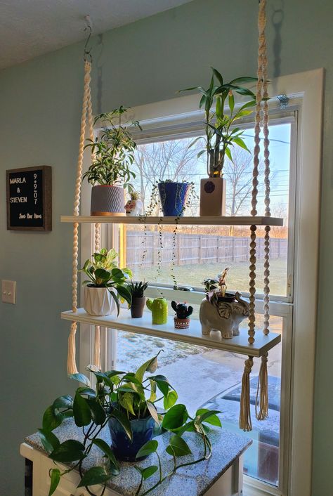 Macrame plant shelves hanger Wood Window Plant Shelf, Macrame Plant Hanger In Window, Hanging Shelf Window, Window Plant Hanger Curtain Rods, Hanging Shelf In Front Of Window, Diy Kitchen Window Shelf, Window Hanging Shelves For Plants, Shelf In Window For Plants, Macrame Window Shelf