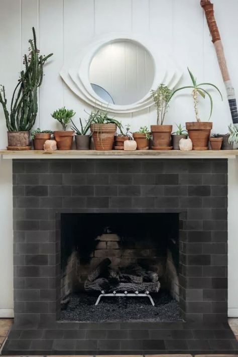 black brick fireplace Black Brick Fireplace, Tile Fireplace, Fireplace Tile Surround, Artisan Tiles, Cle Tile, Rock Fireplaces, White Subway Tiles, Classic Tile, Patio Flooring