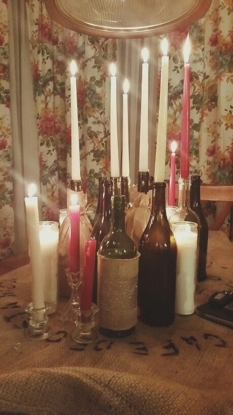 Wine Bottle With Candle Stick, Candlestick Wine Bottle, Candles In Glass Bottles, Wine Bottle Taper Candle Holders, Candles In Wine Bottles Aesthetic, Wine Bottle Candles Aesthetic, New York Room Ideas, Candles In Wine Bottles, Candle In Wine Bottle