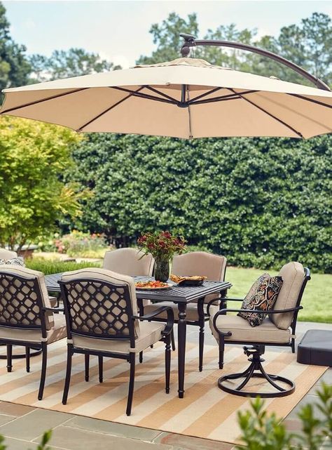 Looking to elevate your outdoor space? Check out our stylish patio furniture set that will transform your patio into a cozy retreat. Our selection of patio furniture sets is perfect for lounging, dining, or entertaining guests. Upgrade your outdoor area with our durable and chic patio furniture set today! Backyard Patio Dining Table, Steel Patio Furniture, Patio Dining With Umbrella, Garden Dining Table Ideas, Teak Outdoor Dining Set, Dining Set Outdoor, Outdoor Dining With Umbrella, Outdoor Dining Umbrella, Patio Dining Set With Umbrella