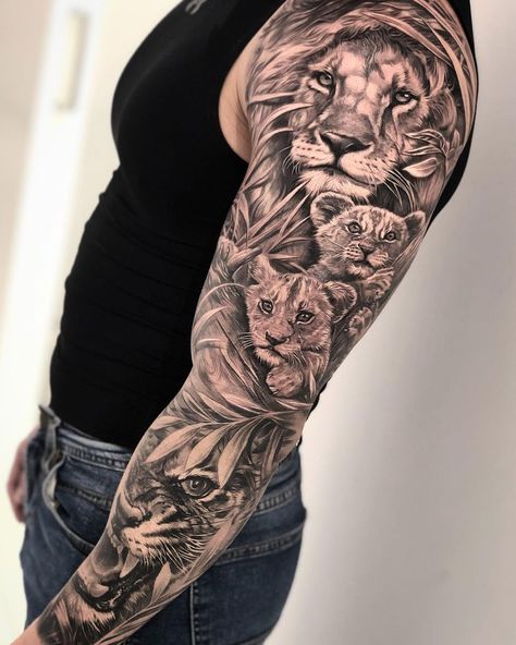 Lion with cubs & tiger sleeve by Dario Castillo, an artist at La Manuela Tattoo in Madrid, Spain. Family Sleeve Tattoo, Voll Arm-tattoos, Lion Shoulder Tattoo, Family Tattoos For Men, Tiger Tattoo Sleeve, Cubs Tattoo, Animal Sleeve Tattoo, Lion Tattoo Sleeves, Family Tattoo Designs