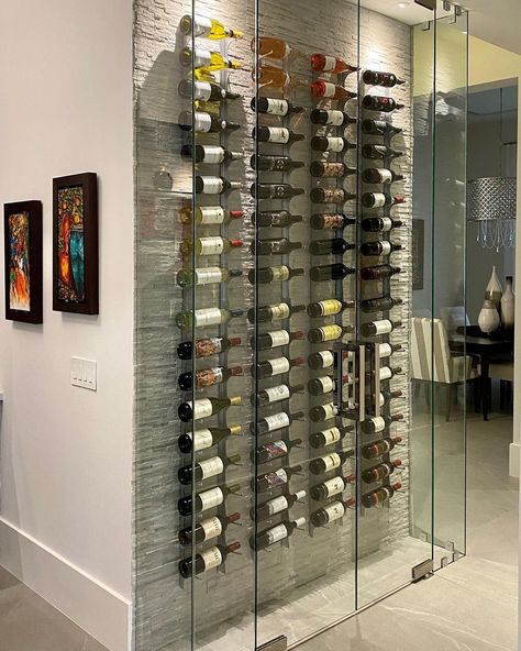 Gil Development on Instagram: “Love to see when our friends fill the beautiful wine displays that we build for them but we love more when they invite us to taste their…” Hallway Wine Storage, Wine Shelves Wall Glass, Glass Wine Room Under Stairs, Wall Wine Storage Glass, Glass Wine Cellar Wall, Wine Tasting Room Ideas, Small Glass Wine Cellar Wall, Wine Displays, Wine Wall Display