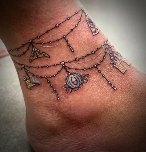 3d Bracelet Tattoo, Lace Anklet Tattoo, Tattoo Charm Bracelet Wrist, Gem Bracelet Tattoo, Anklet Charm Tattoos For Women, Anklet Tattoo With Charms, Disney Anklet Tattoo, Disney Anklet Tattoos For Women, Disney Bracelet Tattoo