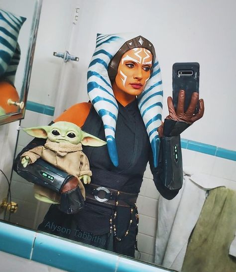 Alyson Tabbitha on Instagram: “I am with child 💚🌌 Quick selfie of my Ahsoka Cosplay! 🧡💙 Makeup & Lekku all made/done/worn by me! Did a photoshoot with @davidlovephotog a…” Star Wars Costume Ideas Women, Womens Star Wars Costume, Ashoka Cosplay, Ahsoka Cosplay, Ahsoka Tano Costume, Alyson Tabbitha, Baddie Halloween, Ahsoka Tano Cosplay, Star Wars Nursery