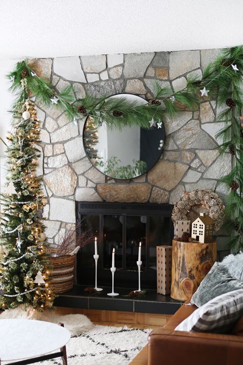 No mantle? No worries! You can still cozy up next to your fresh and inviting fireplace this holiday season with these simple steps. #Christmas, #How-To, #decor, #featured, #Holiday, #fireplace, #mantle, #inexpensive Christmas Mantle Decor Fireplaces, Simple Winter Decor, Christmas Fireplace Mantels, Xmas Fireplace, Holiday Fireplace, Fireplace Garland, Holiday Mantel, Christmas Mantle Decor, Christmas Fireplace Decor