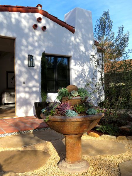 A Modern Design Spin on a Historic Spanish Style Home in SB Spanish Chimney, Mediterranean Landscaping Ideas, Recessed Windows, Flagstone Steps, Spanish Casa, Chimney Design, Before And After Transformation, Spanish Style Architecture, Spanish Home