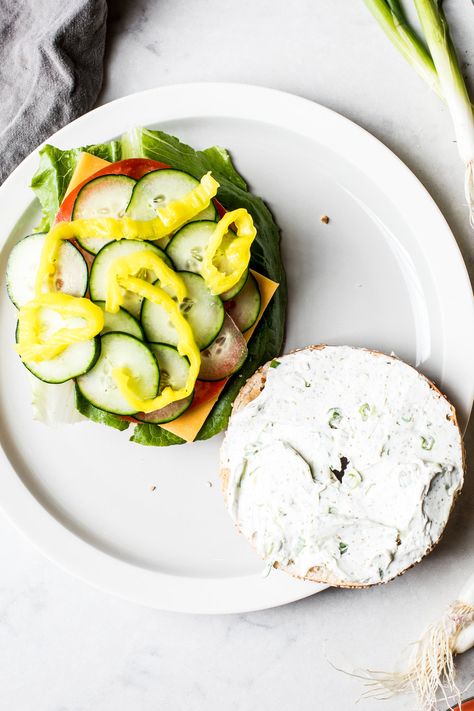 Veggie Bagel Sandwich with Za'atar and Scallion Cream Cheese Open Bagel Sandwich, Bagel Sandwich Ideas Vegetarian, Bagel Veggie Sandwich, Bagel Sandwich Photography, Open Faced Bagel Sandwich, Scallions Recipes, Pepperoncini Peppers, Bagel Shop, Bagel Sandwich