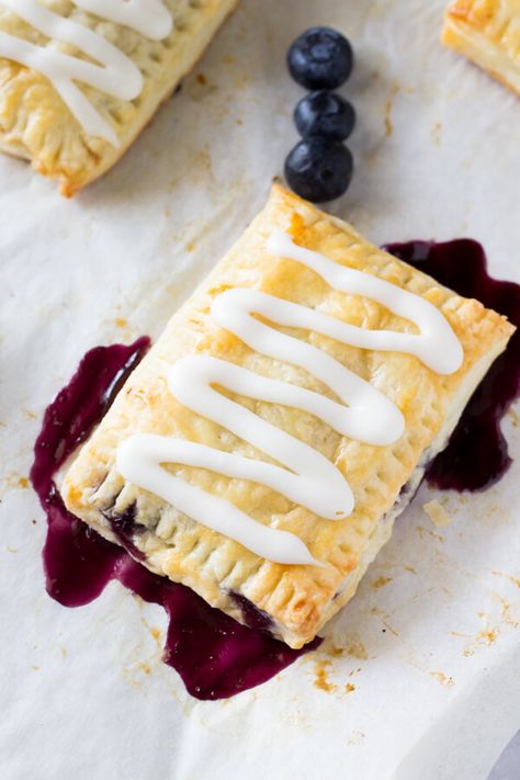 Buttery, flaky homemade blueberry toaster strudels with vanilla glaze. Learn to make them from scratch with this step-by-step recipe. Toaster Strudel Recipe, Homemade Toaster Strudel, Toaster Strudel, Strudel Recipes, Homemade Pastries, Vanilla Glaze, Homemade Snacks, Breakfast Cake, Pastry Recipes