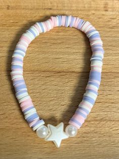 Trending Clay Bead Bracelets, Lavender Clay Bead Bracelet, Aesthetic Clay Bead Ideas, Princess Clay Bead Bracelet, Purple Bracelet Clay Beads, Clay Bead Bracelets With Charms, Pink Bracelets Ideas, Pastel Clay Bead Bracelet Ideas, Pink Clay Bracelet Ideas