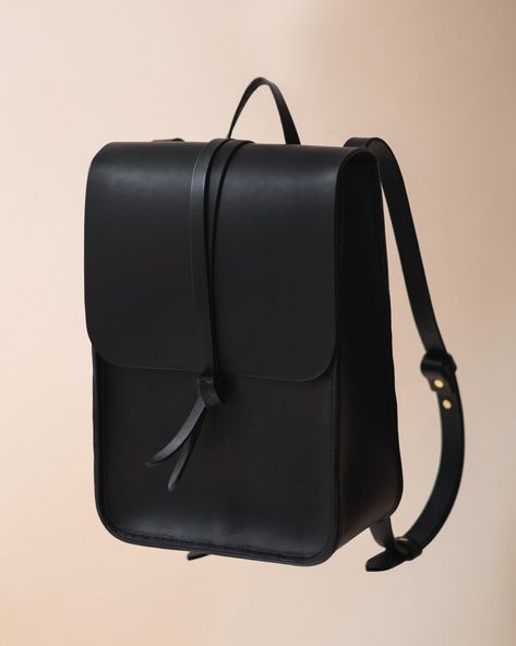 This minimalist, handcrafted backpack is made from the most beautiful, sustainable, raw veg-tanned leather. The leather we use is full grain leather which is known for its natural strength and durability. It will develop a rich patina over time with use, making it even more beautiful as it ages. This backpack is designed to last you a lifetime. With quality over quantity in mind, making it sustainable and truly timeless. Backpack Inspiration, Leather Backpack Women, Small Backpack Purse, Work Backpack, Minimalist Backpack, Minimalist Bag, Sustainable Leather, Women Leather Backpack, Black Leather Backpack