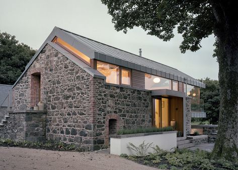 Traditional stone barn updated with a steel-framed living space. Stone Facade, Casas Coloniales, Stone Barns, Exterior Cladding, Barn Conversion, Modern Barn, Stone Houses, House Extensions, Stone House